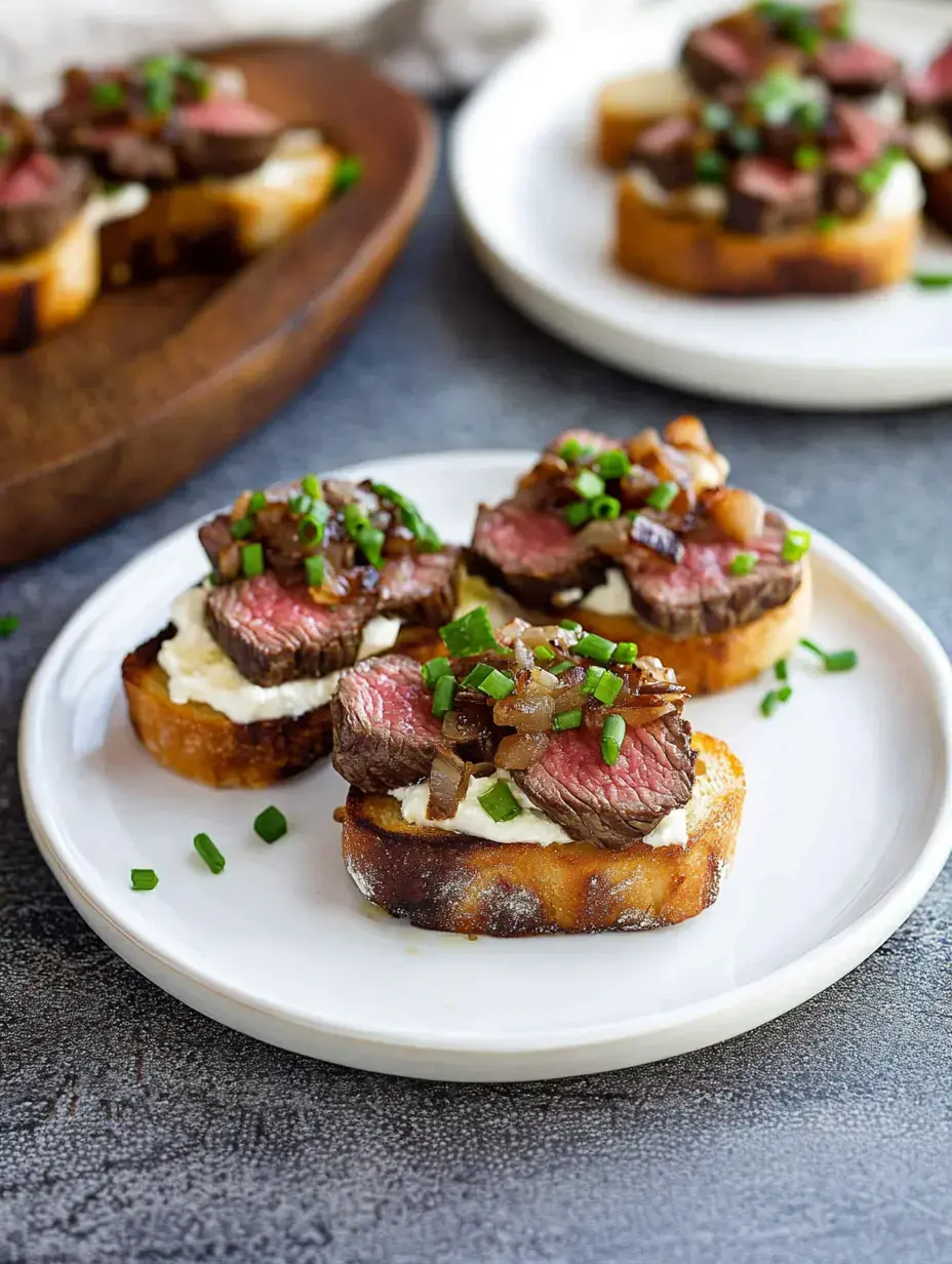 A plate of toasted bread topped with slices of beef, creamy spread, caramelized onions, and chopped green onions.